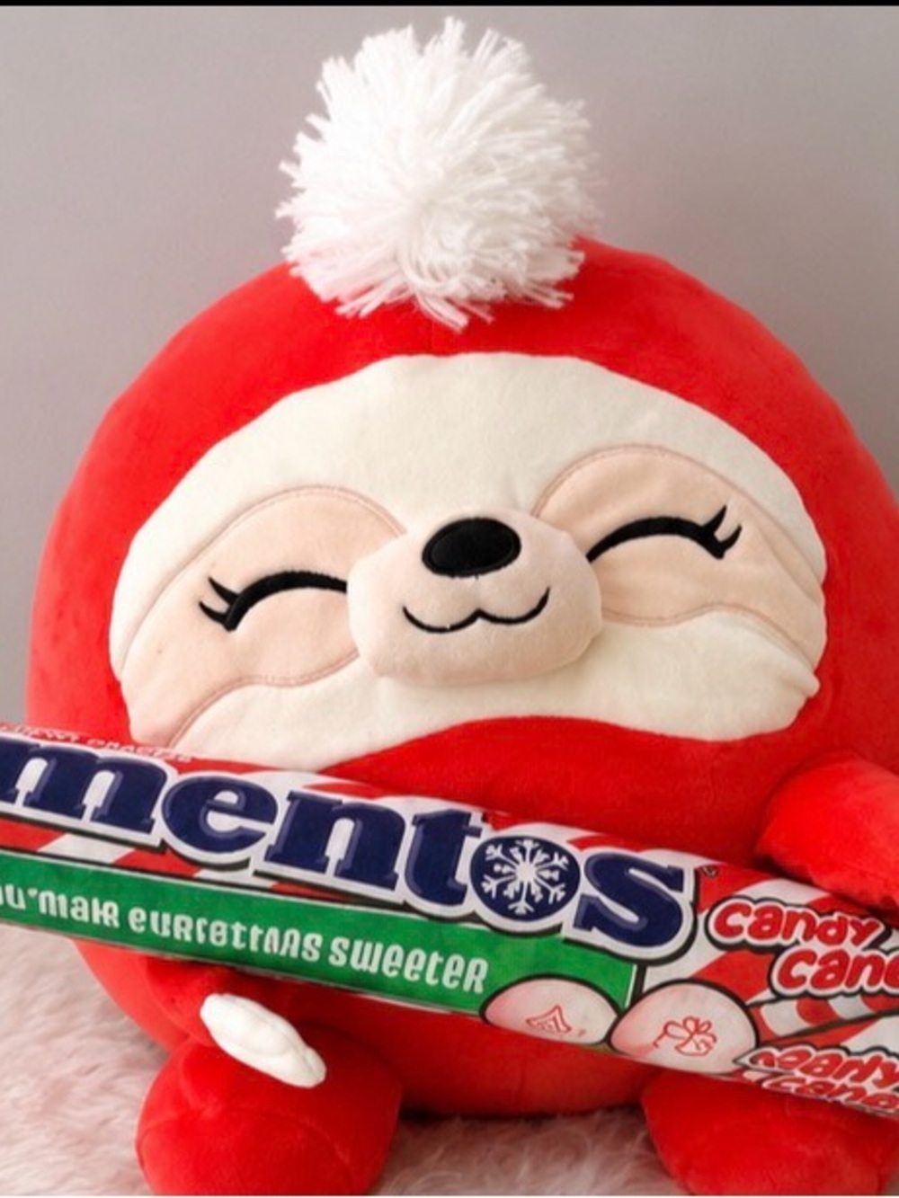 Zuru Snackles “Amy Sloth" holding a Mentos Candy winter/holiday edition 10-12”